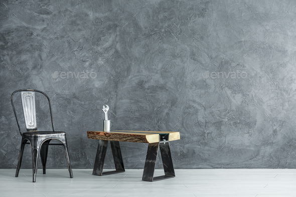 Handyman's dark room with chair - Stock Photo - Images