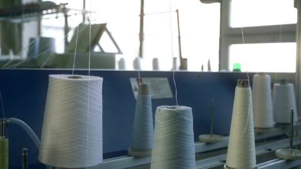 Spools with White Thread at Rewinding Machine Video