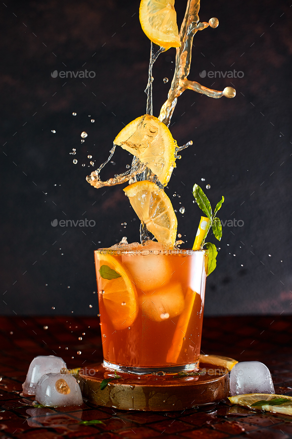 Iced lemon tea in motion concept. - Stock Photo - Images