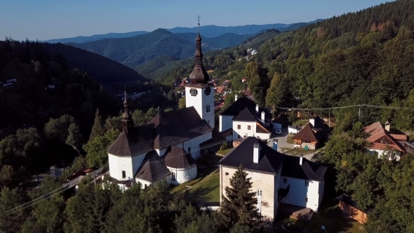 Flying Over Church in Spania Dolina, Slovakia alt