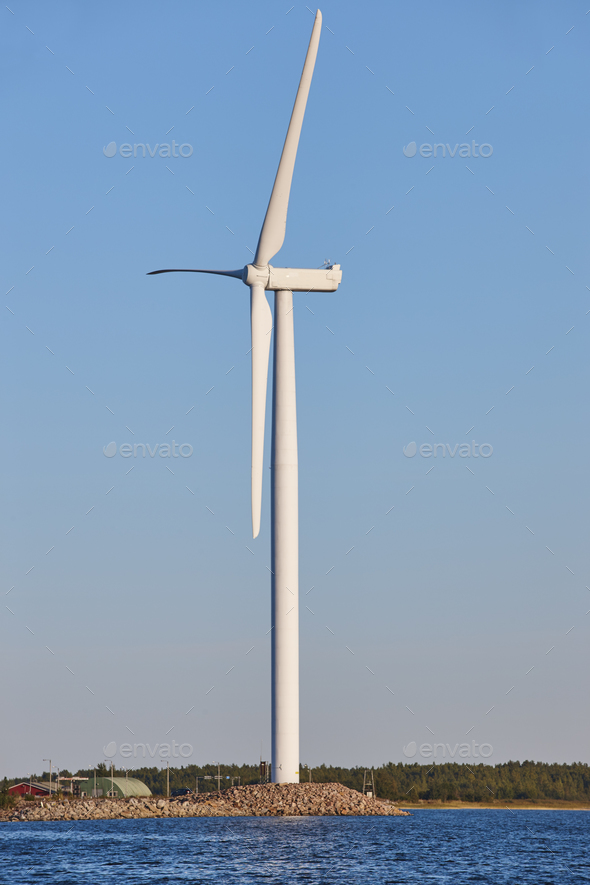 Windmill in the baltic sea. Renewable clean and green energy. Finland Stock Photo by ABBPhoto