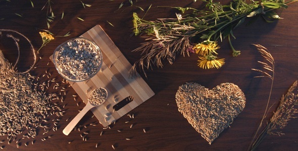 Oats and Oatmeal Flakes on Table alt