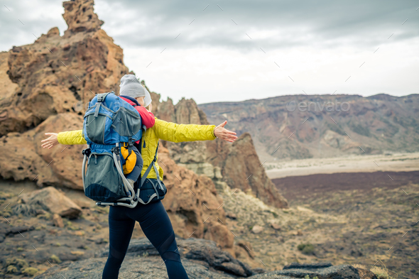 Super mom with baby boy hiking in backpack - Stock Photo - Images