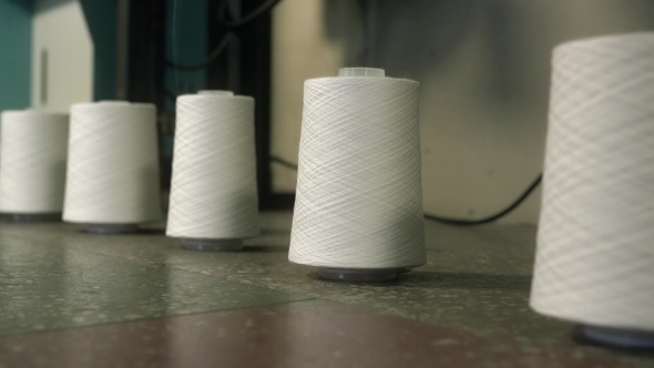 White Thread Spools at a Knitting Shop Video