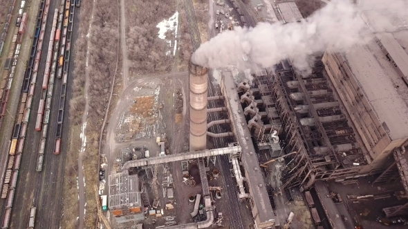 Emission To Atmosphere From Industrial Pipes Smokestack Pipes Shooted with Drone. alt