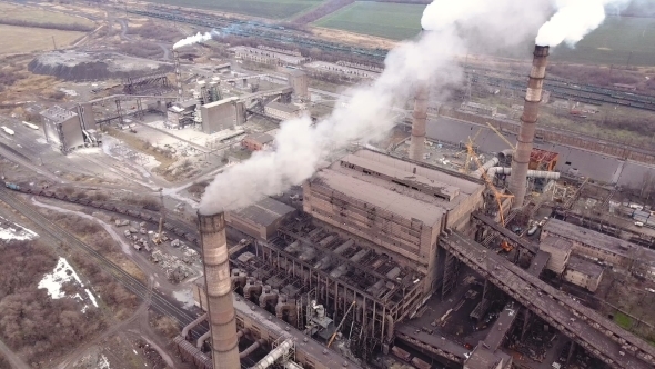 Emission To Atmosphere From Industrial Pipes Smokestack Pipes Shooted with Drone alt