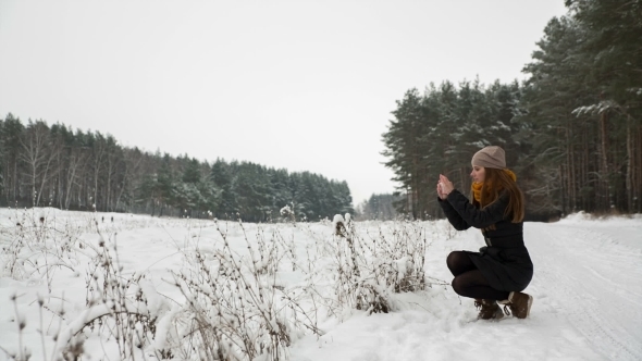 Woman Taking Photo of Beautiful Landscape alt