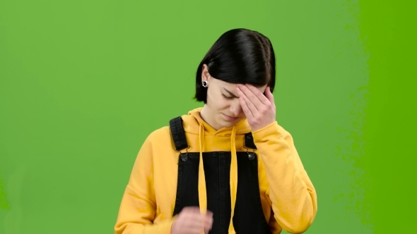 Teenager Suffers From a Headache. Green Screen alt