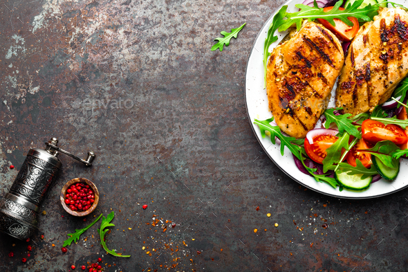 Grilled chicken breast and fresh vegetable salad - Stock Photo - Images