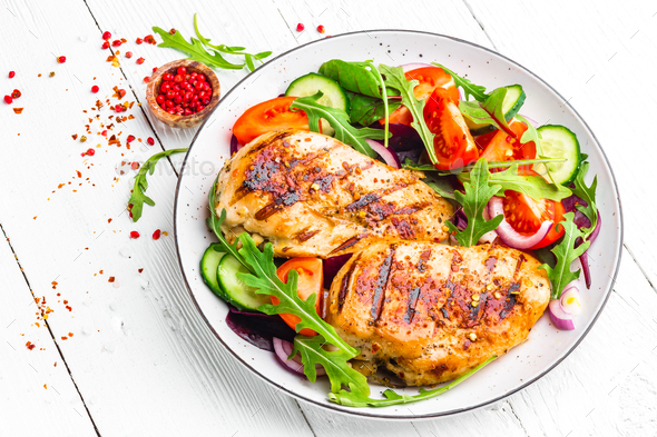 Grilled chicken breast and fresh vegetable salad - Stock Photo - Images