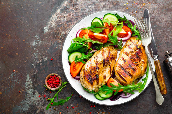 Grilled chicken breast and fresh vegetable salad - Stock Photo - Images