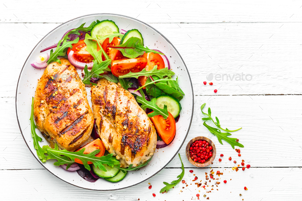 Grilled chicken breast and fresh vegetable salad - Stock Photo - Images