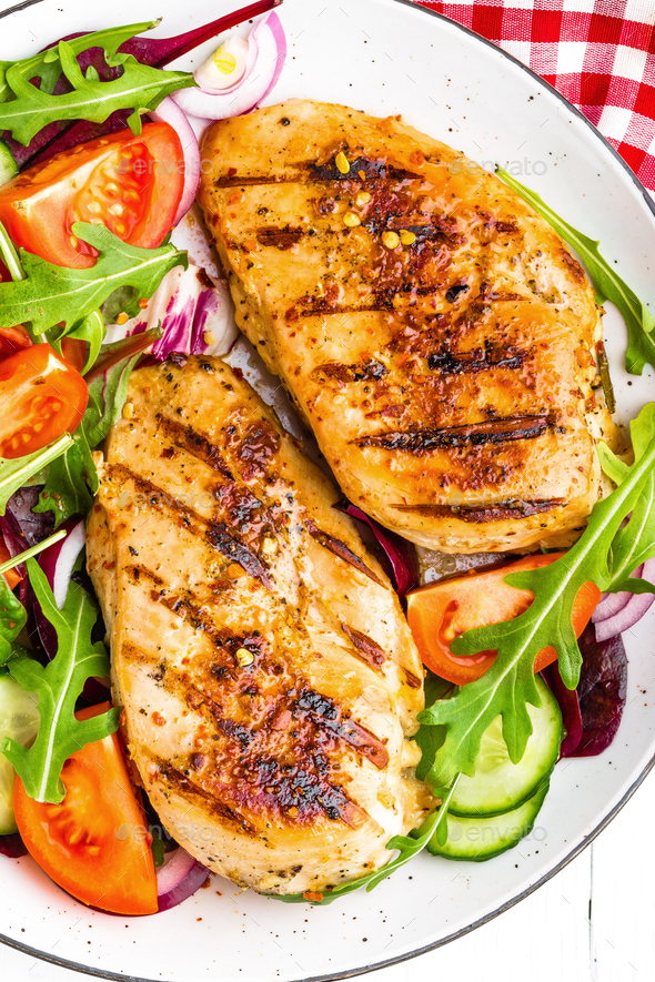 Grilled chicken breast and fresh vegetable salad - Stock Photo - Images