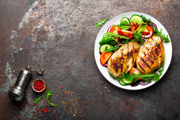 Grilled chicken breast and fresh vegetable salad - Stock Photo - Images