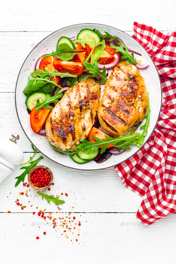 Grilled chicken breast and fresh vegetable salad - Stock Photo - Images
