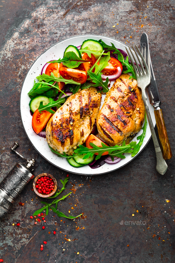Grilled chicken breast and fresh vegetable salad - Stock Photo - Images