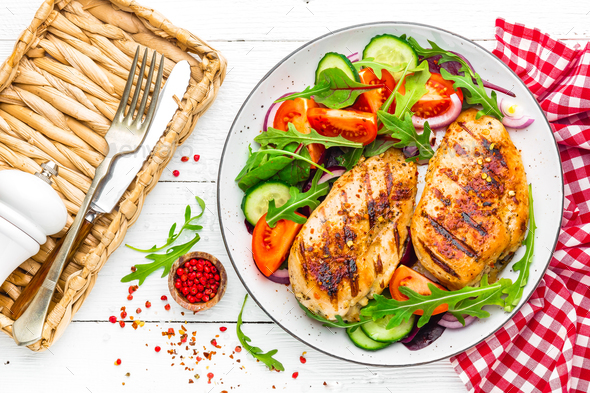Grilled chicken breast and fresh vegetable salad - Stock Photo - Images