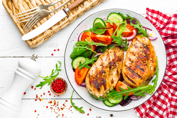 Grilled chicken breast and fresh vegetable salad - Stock Photo - Images