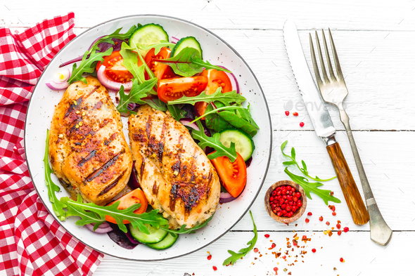 Grilled chicken breast and fresh vegetable salad - Stock Photo - Images