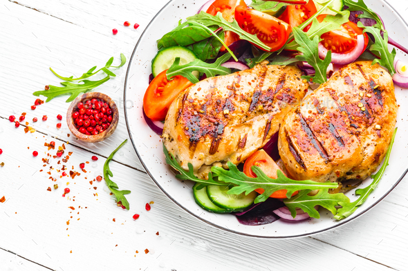 Grilled chicken breast and fresh vegetable salad - Stock Photo - Images