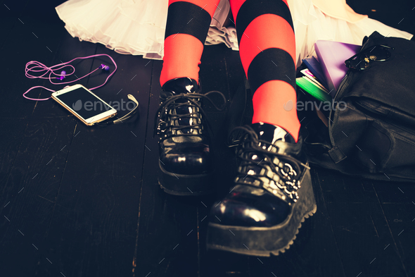 Young alternative girl with school bag - Stock Photo - Images