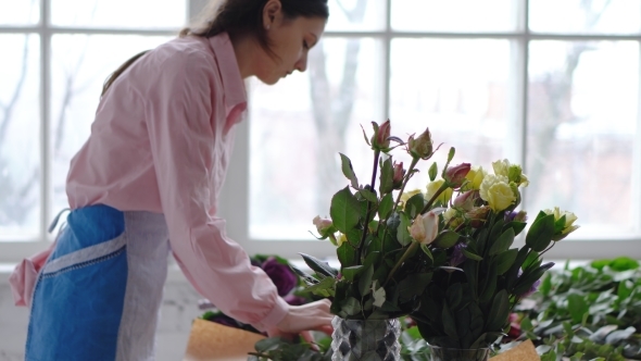 Florist at Work: Young Woman Making Modern Bouquet of Different Flowers
