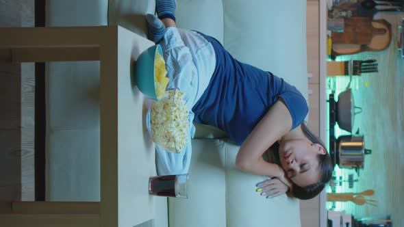 Vertical Video: Housewife Falling Asleep in Living Room alt