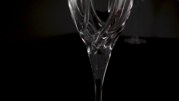 Wine Is Poured Into a Glass
