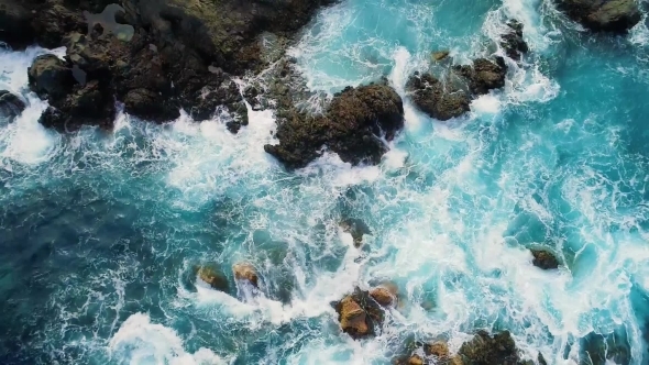 Top Down View of Waves and Clifs