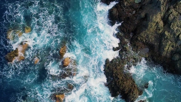 Top Down View of Waves and Clifs