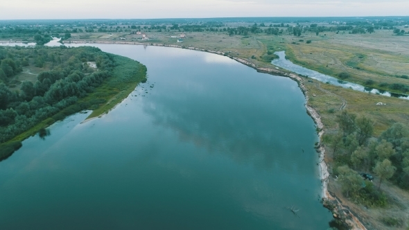 Aerial View. Flying Over the Beautiful River Aerial Camera Shot Landscape Panorama