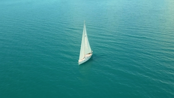 Yacht Sailing on Opened Sea. alt