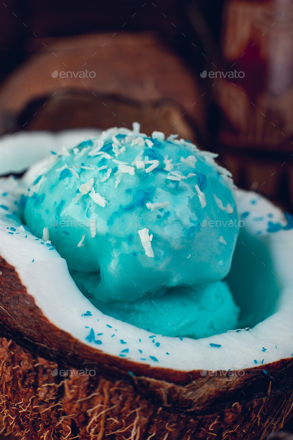 Blue ice cream in coconut bowl. Stock Photo by bondarillia PhotoDune