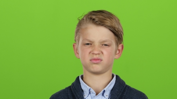 Kid Is Upset and Sad on Green Screen alt