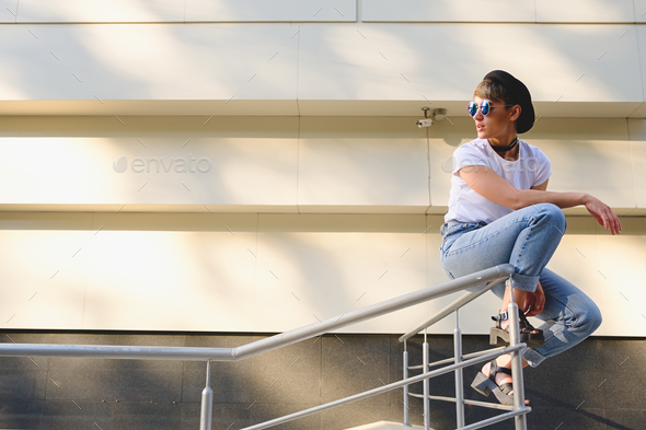 Modern woman portrait wearing stylish round glasses hanging out - Stock Photo - Images