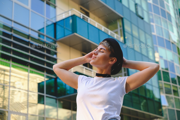 Portrait fashionable woman taking a breake from work relaxing - Stock Photo - Images