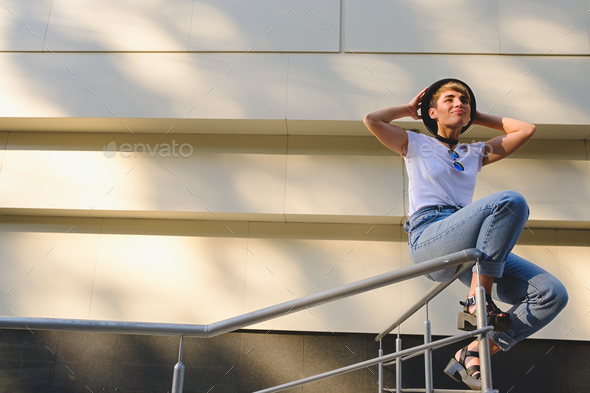 Young hipster woman relaxing - Stock Photo - Images