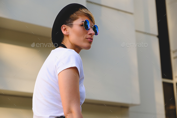 Woman wearing fashionable sunglasses - Stock Photo - Images