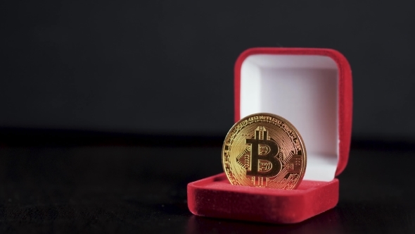 Gold Bitcoin. Treasures - Crypto Currency Litecoin Ethereum. Old Wooden Box Virtual Money on a Dark alt