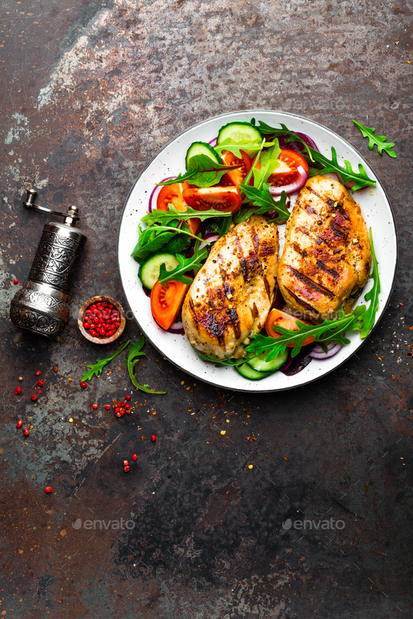 Grilled chicken breast and fresh vegetable salad - Stock Photo - Images