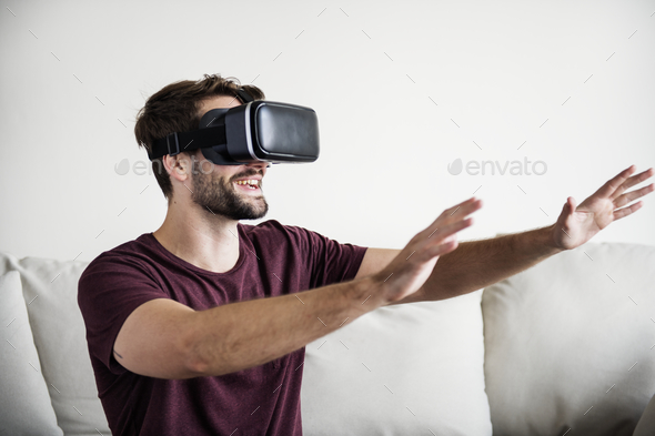 White man enjoying VR - Stock Photo - Images