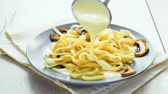 Tagliatelle Pasta with Mushrooms and Creamy Bechamel Sauce