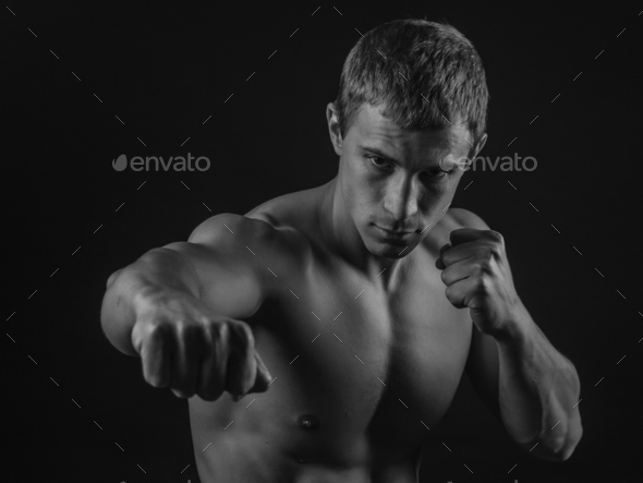 Young fit man shadow boxing - Stock Photo - Images