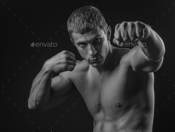 Young fit man shadow boxing - Stock Photo - Images