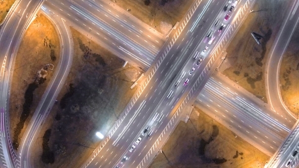 Hyperlapse  of Night City Traffic. Vertical Aerial View.