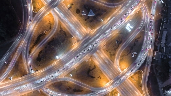 Hyperlapse  of Night City Traffic. Vertical Aerial View.