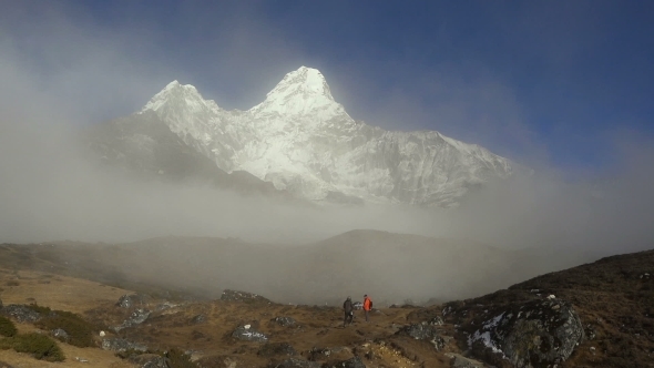 Trekker Below Ama Dablam in the Nepal Himalaya