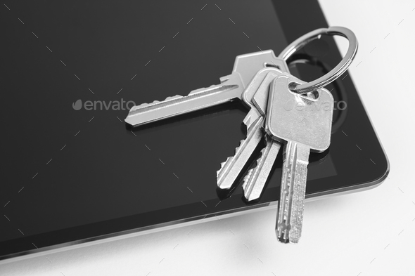Tablet and home keys isolated on white. Buy, sell, rent - Stock Photo - Images