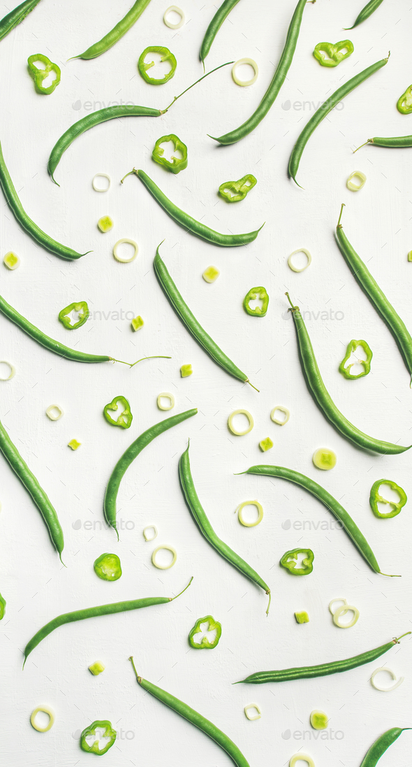 Flat-lay of fresh green beans over white background, top view - Stock Photo - Images