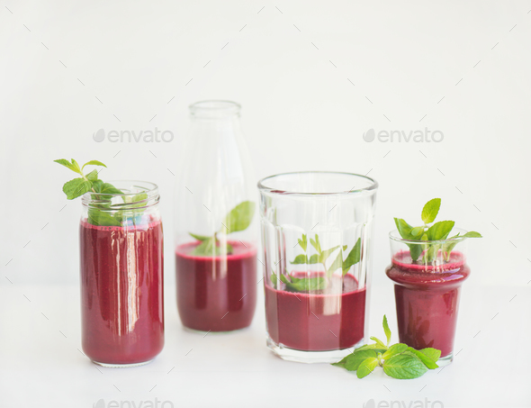 Fresh morning beetroot smoothie or juice in glasses with mint - Stock Photo - Images